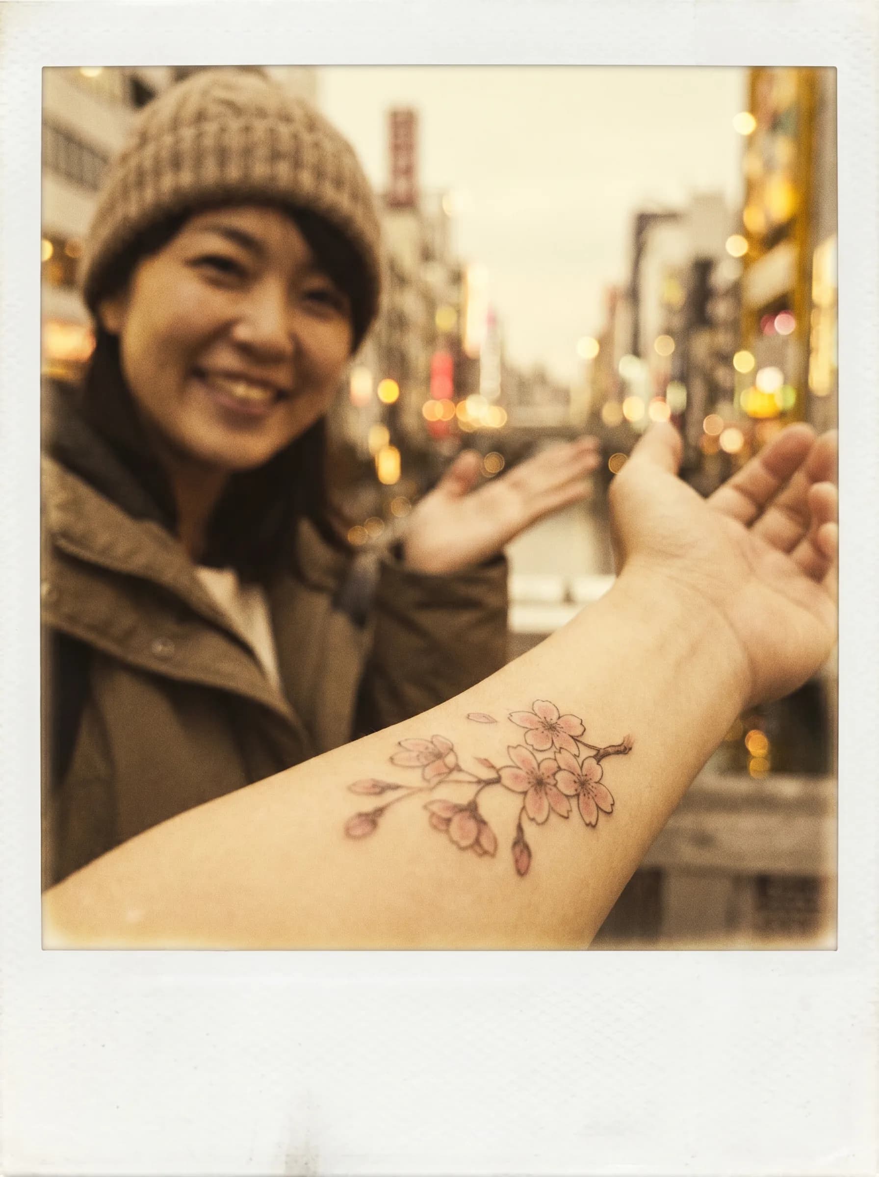 A traveller showing a cherry blossom tattoo